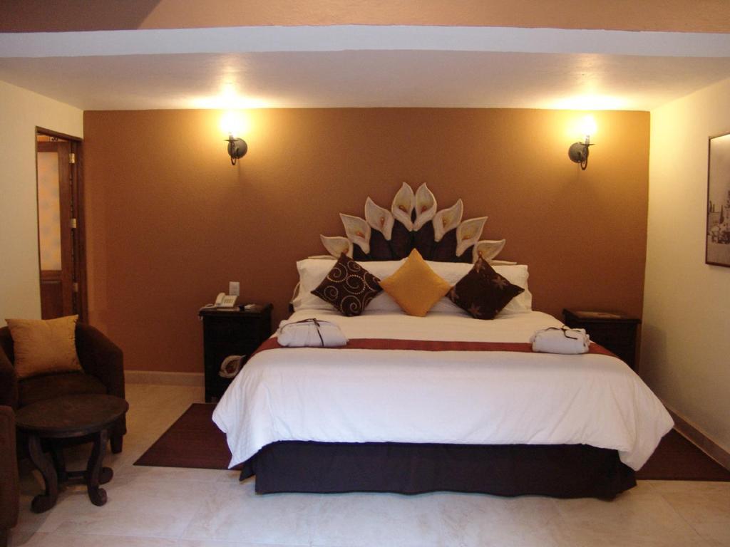 Casa Del Tio Hotel Boutique Сан-Міґель-де-Альєнде Номер фото A room at the hotel